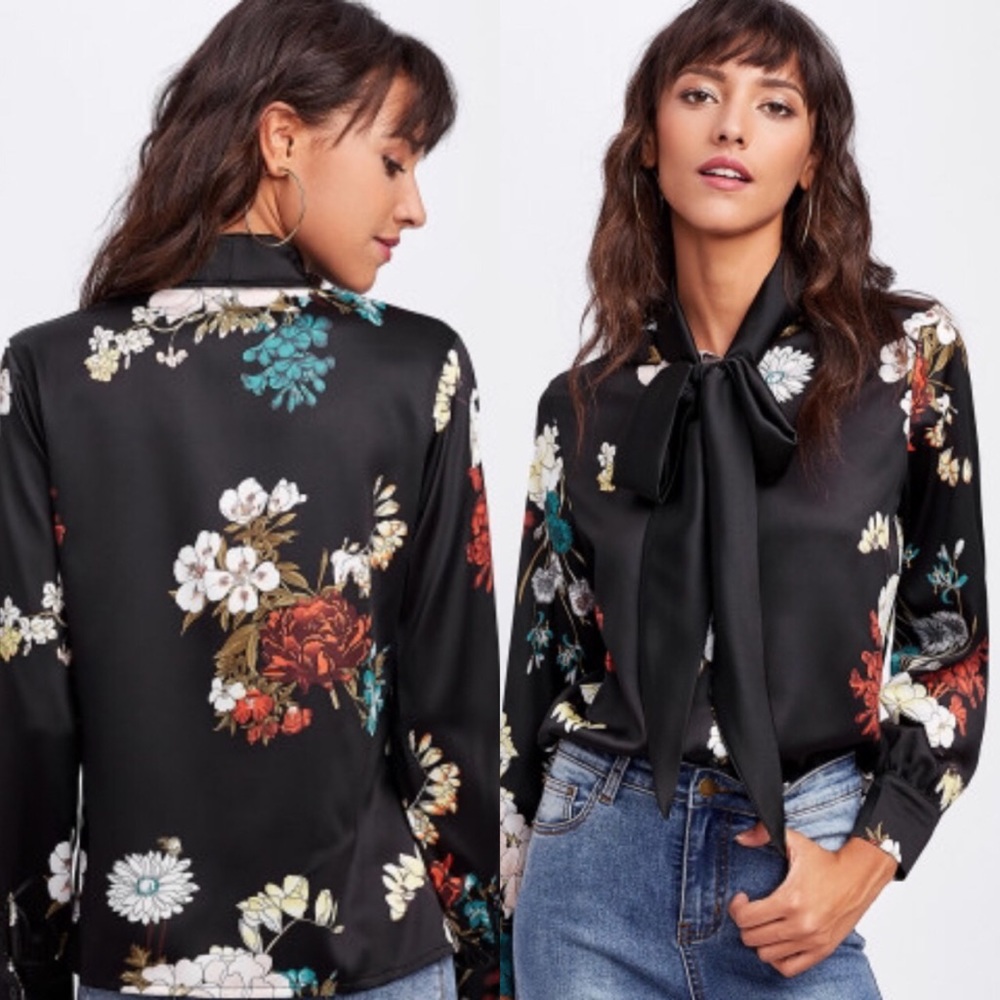 New. Black floral tie neck blouse.
